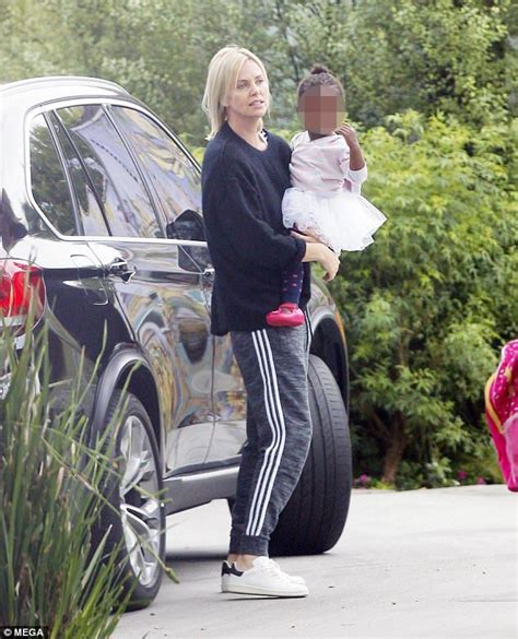 Doting Mother Charlize Theron Dresses Down For Playdate Charlize