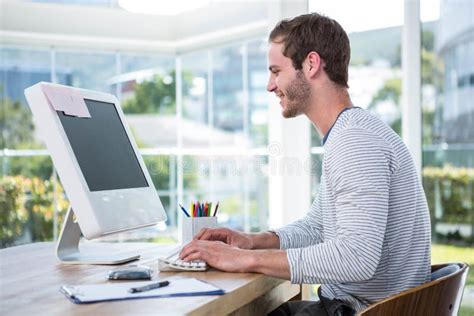 Handsome Man Working On Computer Stock Photo Image Of Enjoying Cute