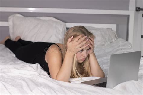 Beautiful Exhausted Blonde With Laptop On Bed With White Sheets Pretty People At Isolation