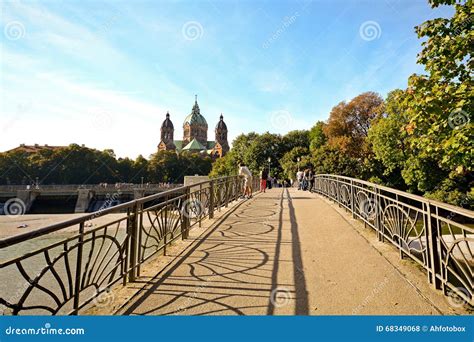 Riverside with Bridge Across the Isar River in Munich, Bavaria Germany ...