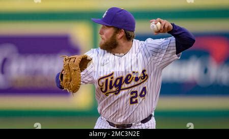 Lsu First Baseman Cade Beloso Celebrates With Fans After Their Team