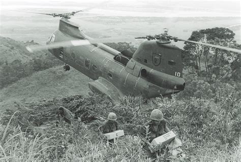 SEA KNIGHT: A Boeing-Vertol CH-46 Sea Knight delivers supplies to a ...