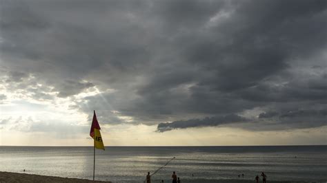 Storm on the ocean. Thunderous dark clouds over the ocean. Timelapse ...