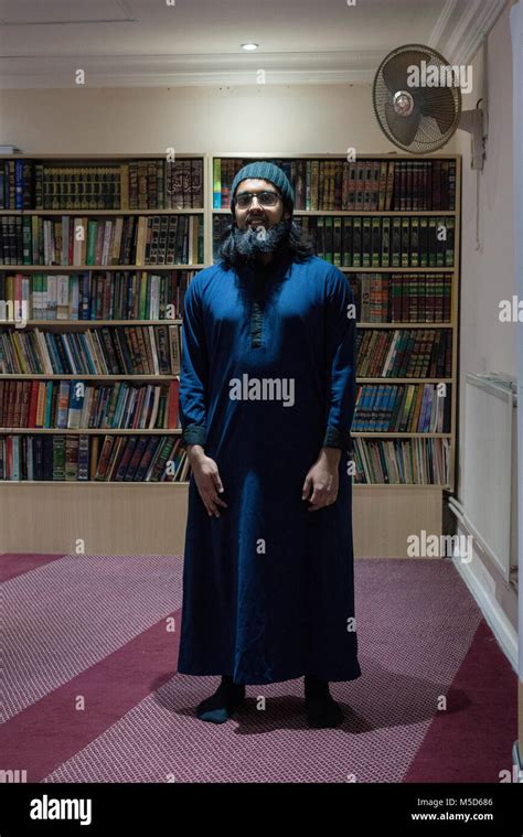 A Muslim Cleric Stands In A Mosque In Brighton For A Portrait Stock