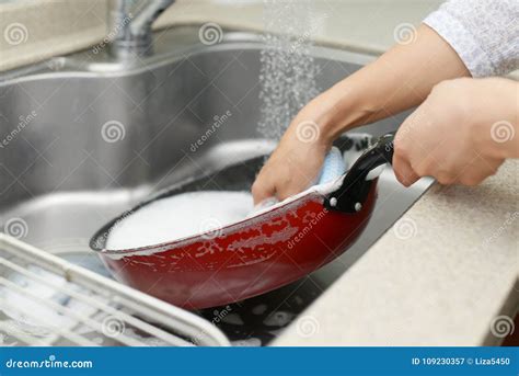 Woman Wash The Frying Pan Stock Image Image Of Closeup 109230357