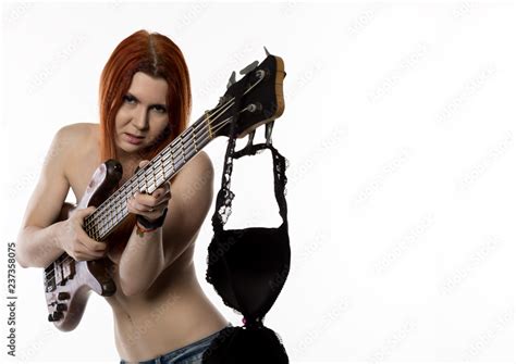 Sexy Nude Rock Woman Playing On Electric Guitar On A White Background Free Space For Text