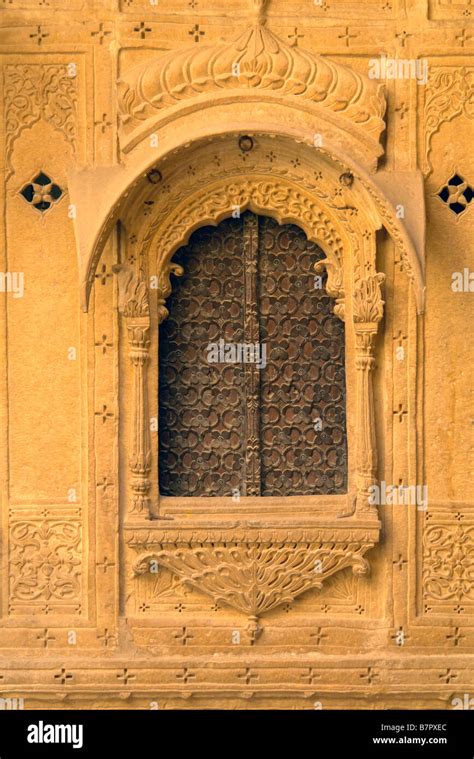 Carved Sandstone Window With Shutters In Traditional Indian Haveli Or