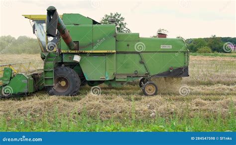 Lviv Ukraine Old John Deere Combine Harvesting Wheat In