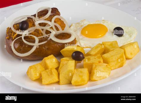 Traditional Portuguese Alheira Sausage With Potatoes And Egg Stock