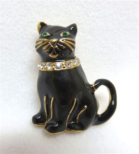 Vintage Signed Monet Black Enamel Cat Pin Brooch Green Rhinestone Eyes