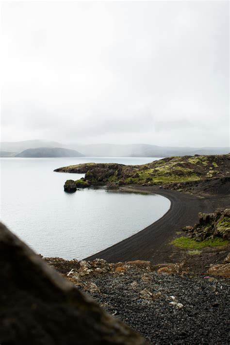 Rock Cliff Near Seashore · Free Stock Photo