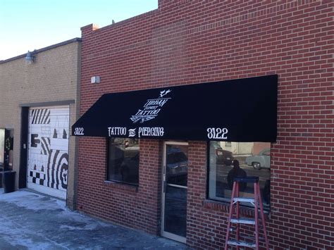 Finished Awning Installed New Fabric Custom Painted Logo Business