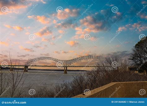 The Memphis And Arkansas Bridge Over The Vast Flowing Waters Of The