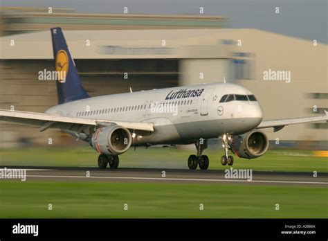 Lufthansa Airbus A320 landing at London Heathrow Airport Stock Photo ...