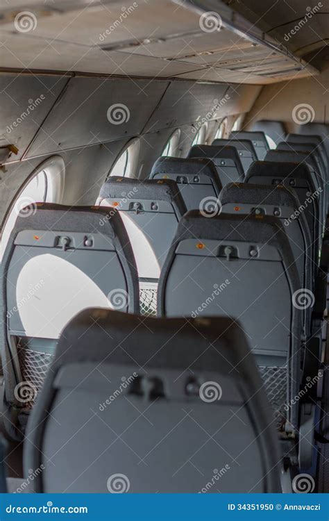 Airplane seats in a row stock photo. Image of people - 34351950