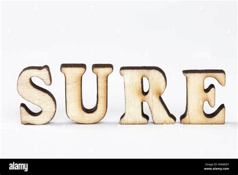 sure, Wood letters SURE on White background Stock Photo - Alamy