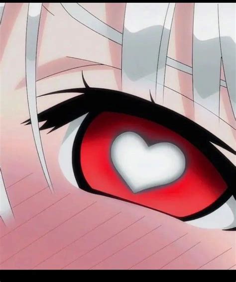 An Anime Characters Eye With A Heart In The Center