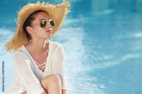 Sexy Girl With Healthy Skin In Elegant Striped Bikini Sun Hat Relaxing