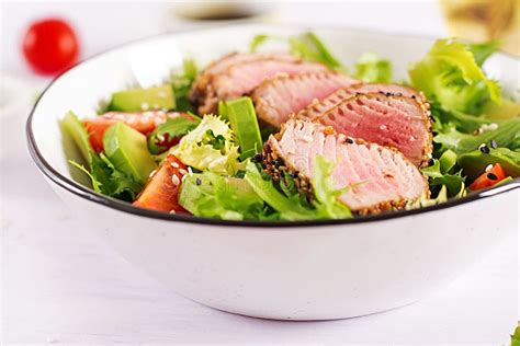 Japanese Traditional Salad With Pieces Of Medium Rare Grilled Ahi Tuna