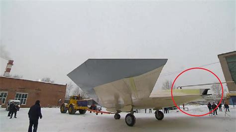 Russia Rolls Out Flying Prototype Of Its New Stealth Combat Drone