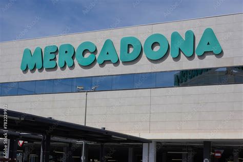 Finestrat, Spain - April 9, 2024: Mercadona logo sign on supermarket wall. Mercadona is popular ...