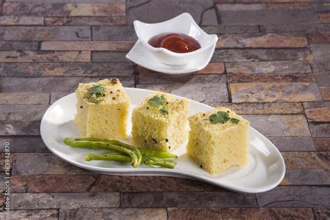 Gujarati Khaman Dhokla Or Steamed Gram Flour Snack Stock Photo Adobe