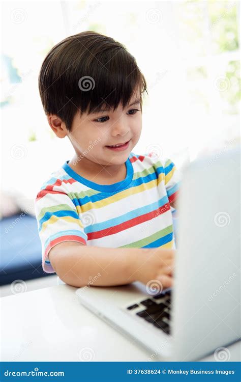 Asian Child Using Laptop At Home Stock Photo Image Of Computer Race