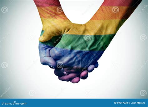 Gay Couple Holding Hands Patterned As The Rainbow Flag Stock Photo