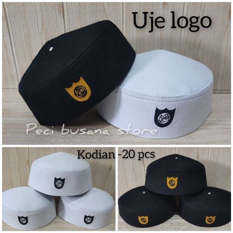 jual uje logo putih  pcs kodian peci haji peci malasya peci