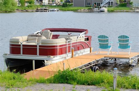 Photos Pontoon Boat Docks Pontoon Boat Tied To A Dock Stock Photo