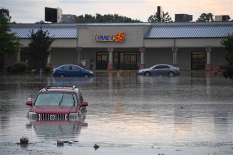 Flash Flood Hits Jackson Heavy Rain Causes Two Sink Holes