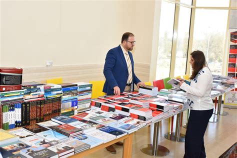 مكتبة خليفة تنظم معرض جامعة العين للكتاب 2024 جامعة العين واحدة من