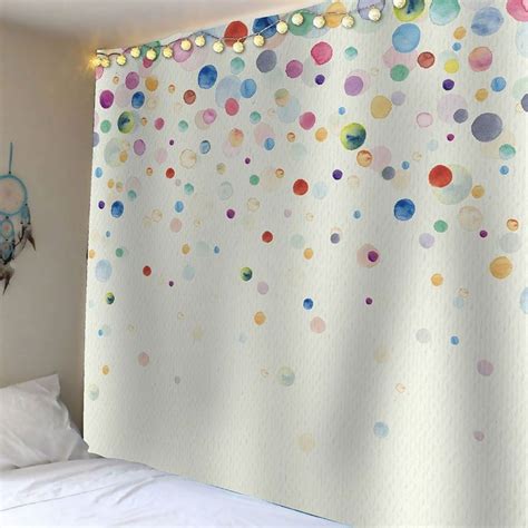 A Room With A Bed And Curtains Decorated With Multicolored Circles On