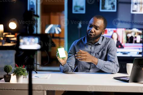 Content creator filming tech tutorial on how to do mini RGB lights