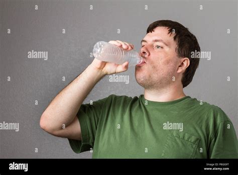 Man Trying To Drink Water On A Nice Hot Day Stock Photo Alamy