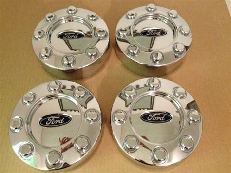 Sell 2011 FORD F250 XLT CHROME CENTER CAPS 4 GREAT CONDITION In