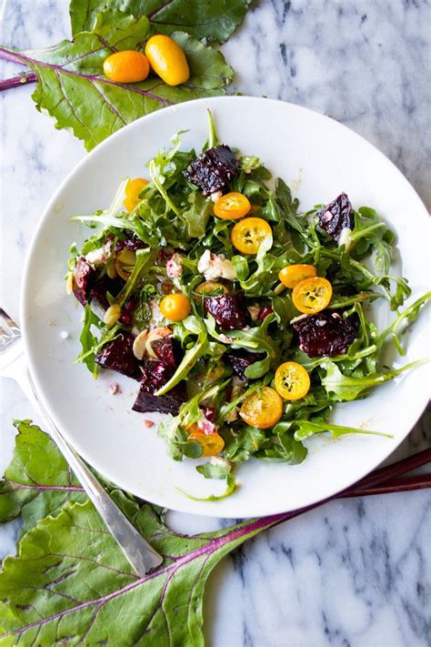 Roasted Beet Salad With Goat Cheese Kumquats Pomegranates And Arugula