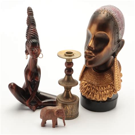 Indian Engraved Brass Candlestick With African Bust And Other Figurines Ebth