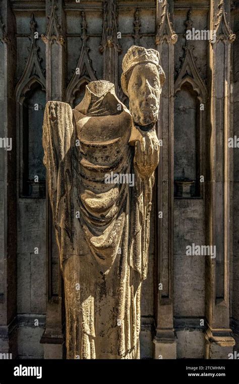 Statue of Saint Cuthbert holding his head, Durham Cathedral Stock Photo ...