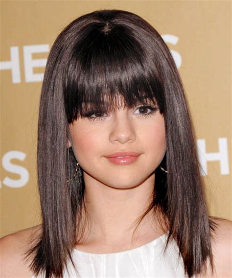 Selena Gomez Long Straight Black Hairstyle With Layered Bangs