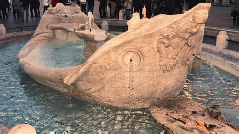 Sunset In Rome With The Famous Barcaccia Fountain Located In Piazza Di