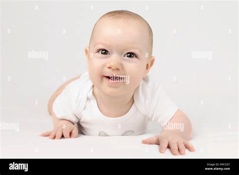 Baby Boy Lying On His Belly Stock Photo Alamy