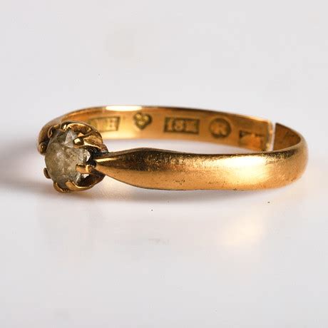 RING 18 K guld med vit sten Smycken Ädelstenar Ringar Auctionet