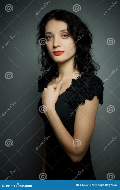 Portrait Of Amazing Young Brunette Woman With Red Sensual Lips Posing