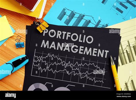 Portfolio Management Report With Data And Financial Charts Stock Photo