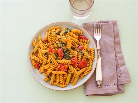 Whole Grain Pasta Dish With Tomatoes And Rocket Stock Photo Image Of