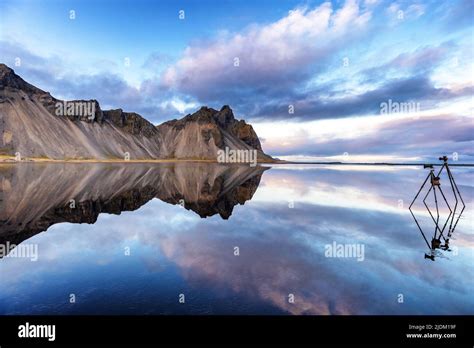 vestrahorn mountains reflected  shallow waters southern iceland
