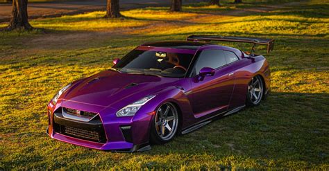 Purple Nissan GT-R Parked on Grass · Free Stock Photo