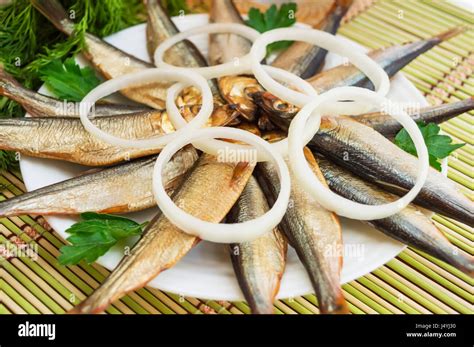 Smoked small fish (kilka, sprat, herring Stock Photo - Alamy