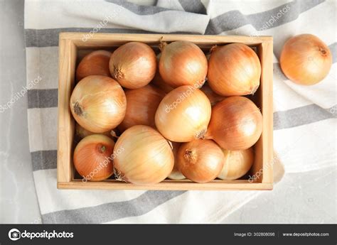 Wooden Crate With Ripe Onions On Grey Table Flat Lay Stock Photo By